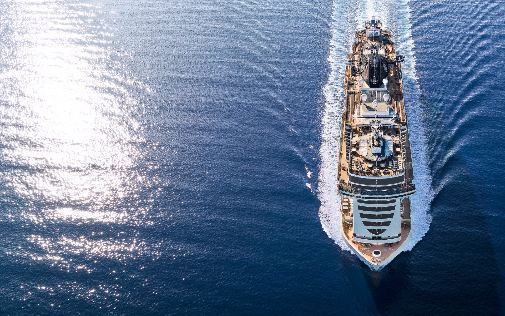 An MSC cruise ship sailing in the sun