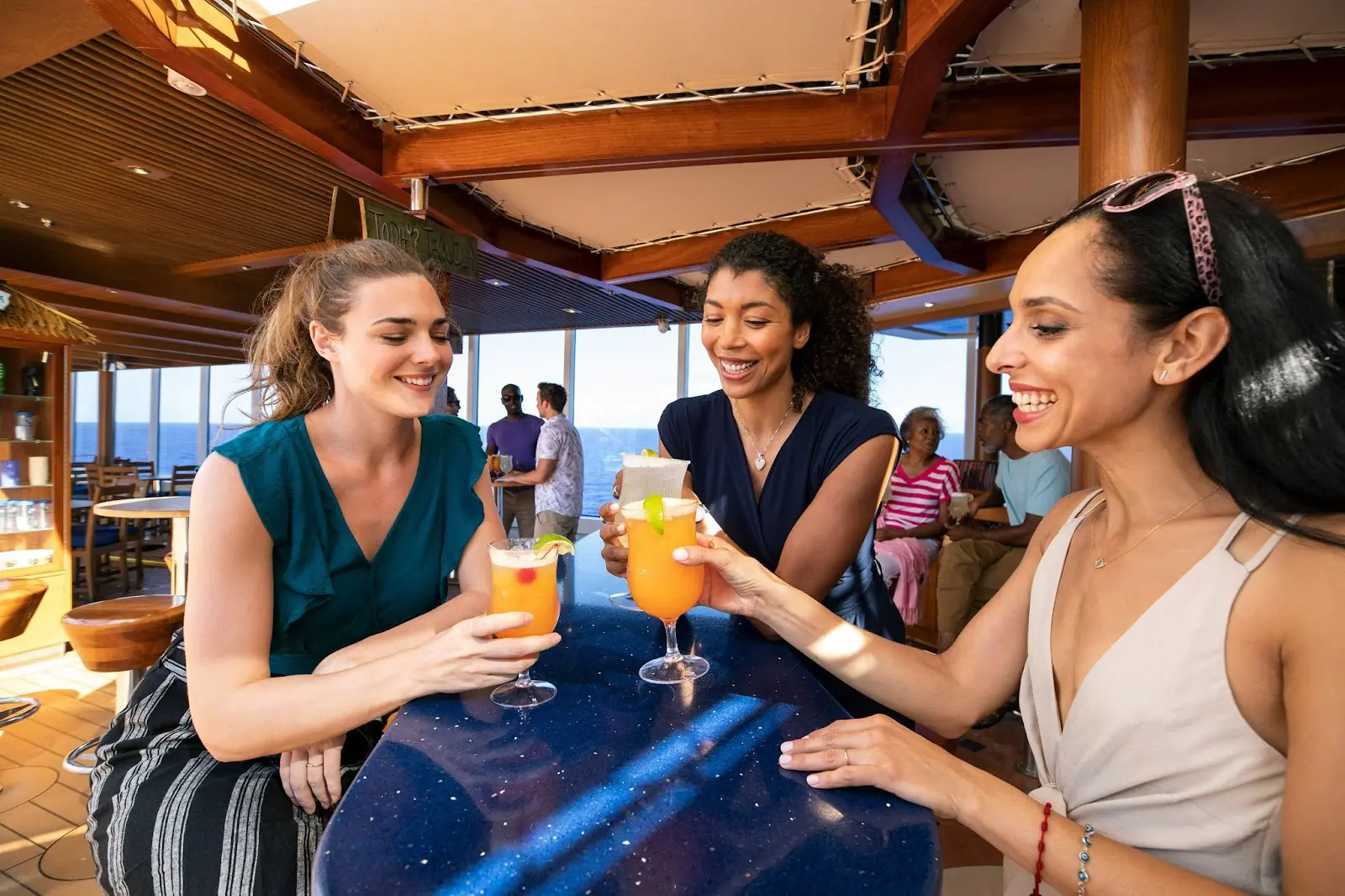 Guests on Carnival enjoying drinks