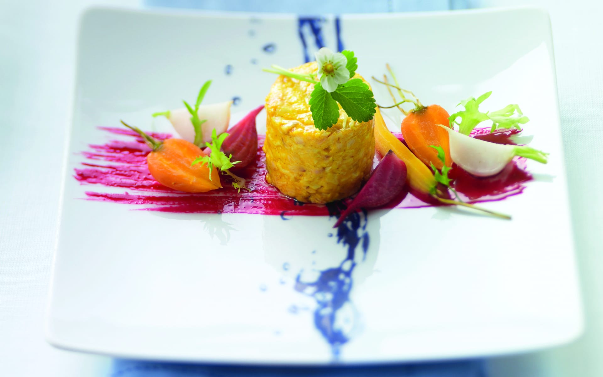 A Celebrity Cruises beetroot salad on a square plate