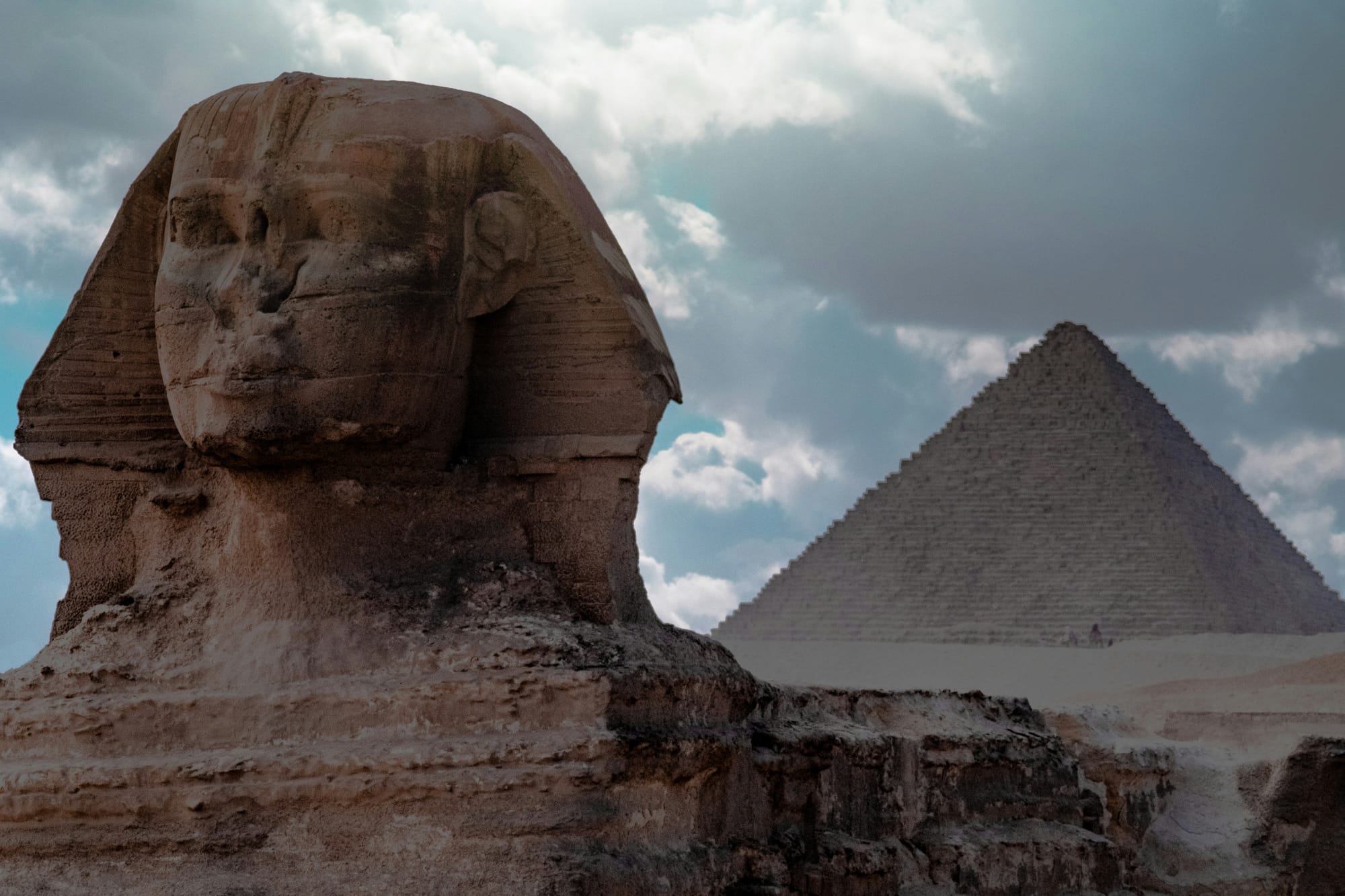 The Great Sphinx, with the Great Pyramids of Giza, in Cairo, Egypt