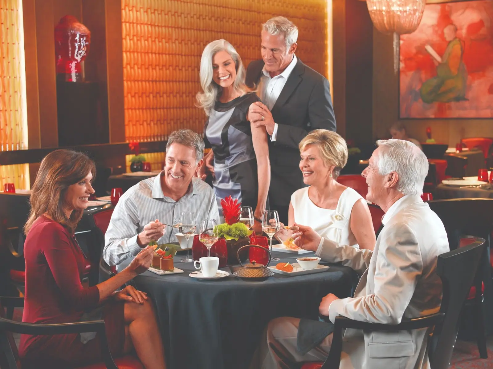 Guests at dinner on Oceania Cruises