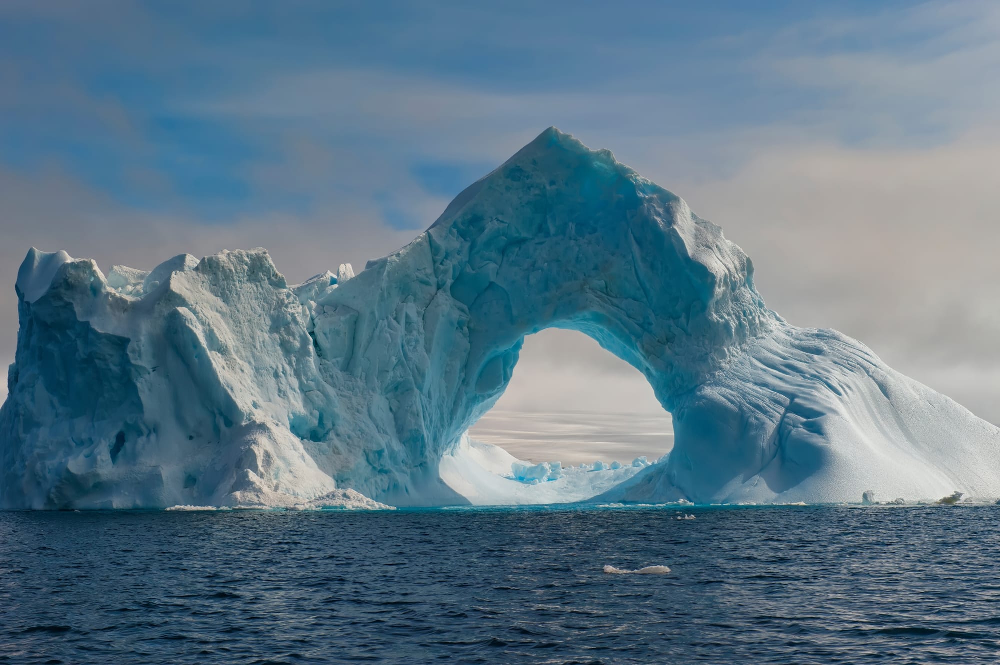 An image of a natural archway in Antarctica