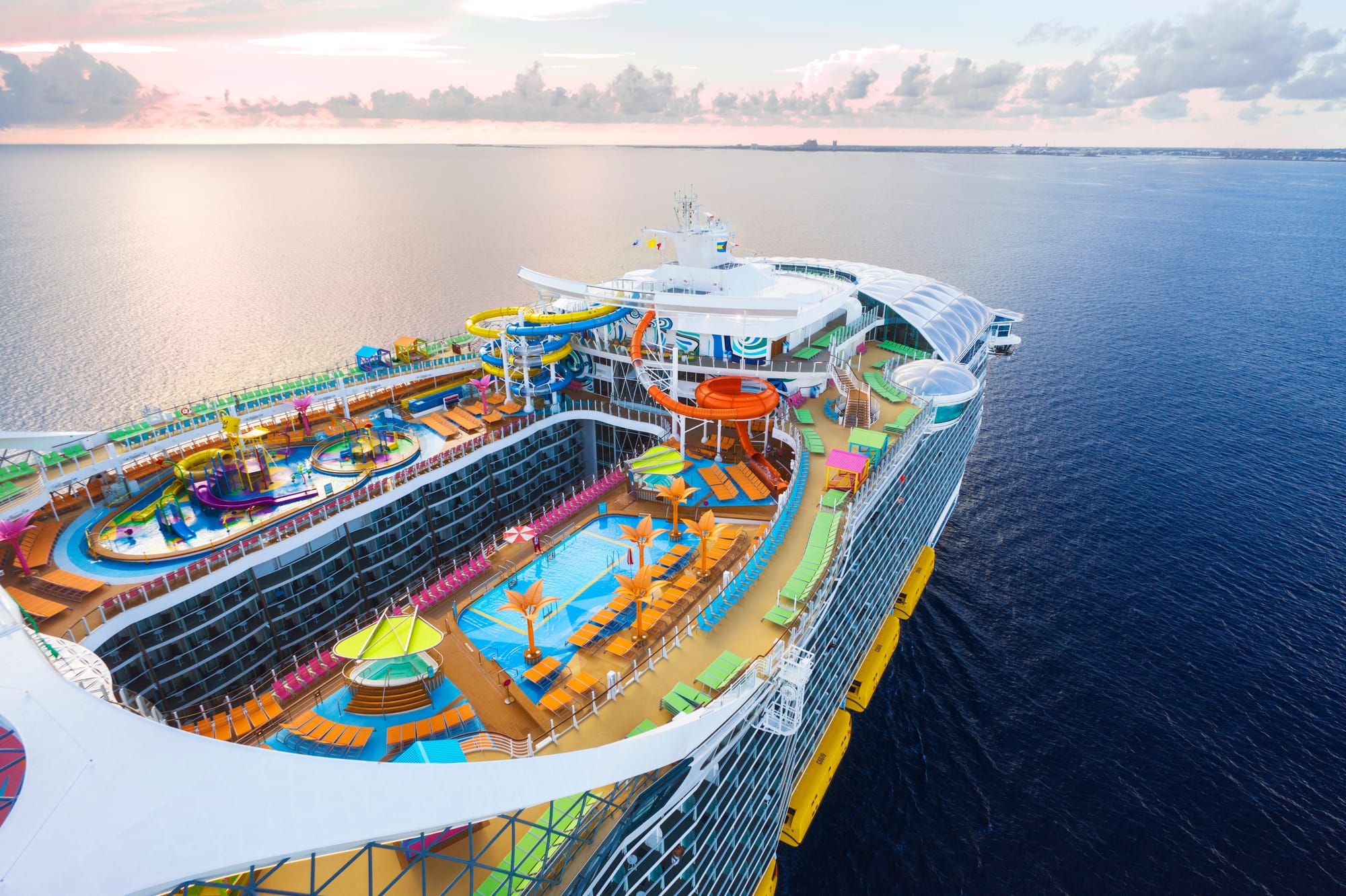 An image of Utopia of the Seas' top deck from above, while the ship is in open water