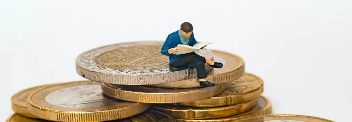 Man Sitting on Money